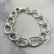 Load image into Gallery viewer, silver link bracelet on marble background