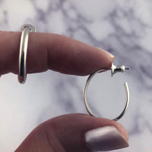 Load image into Gallery viewer, Elliptics: Medium Size Oval Silver Hoop Earrings