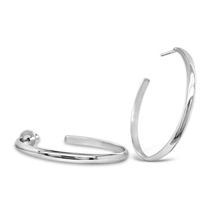 Large round silver post hoop earrings on white background